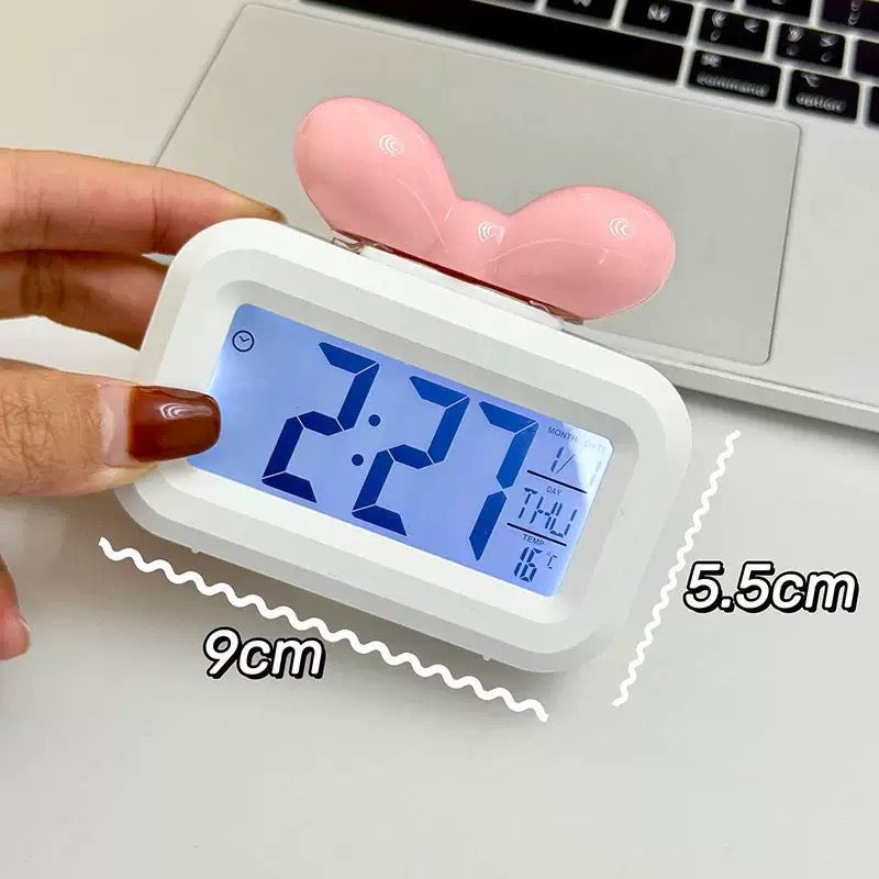 Clock with alarm and light