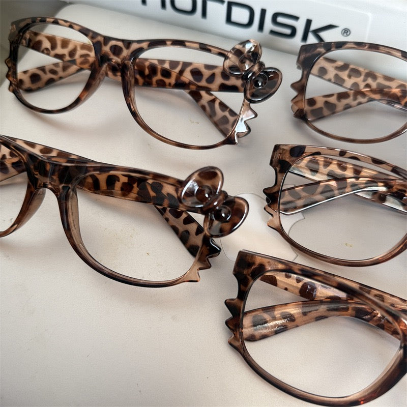 Leopard print retro eyeglass frames, classic Kitty-style cute tortoiseshell color, subculture aesthetic — sweet yet edgy, perfect effortless look enhancer.